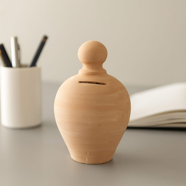 Salvadanaio in terracotta